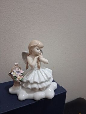 Porcelain Angel Figurine with Pastel Flowers